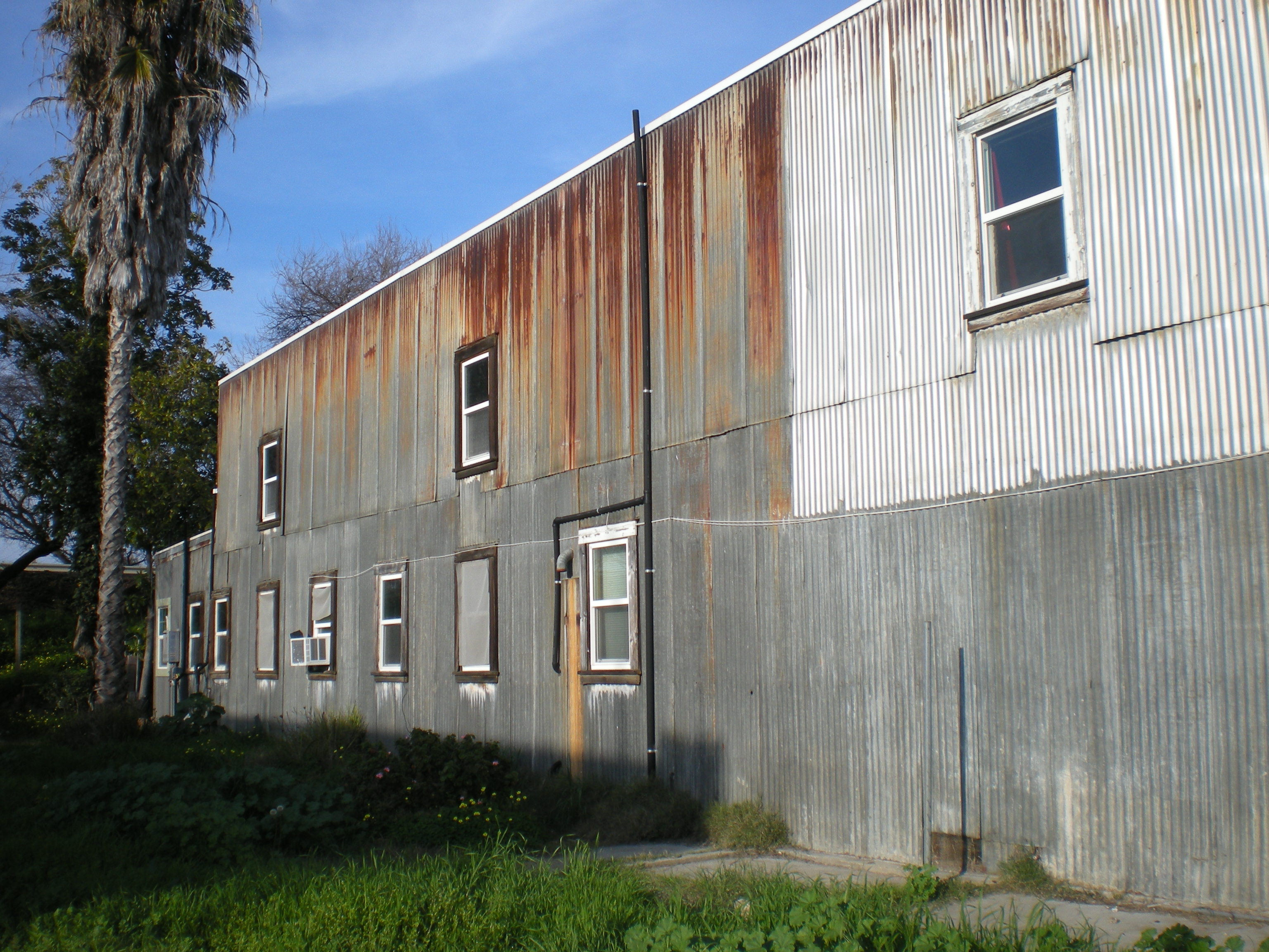 Side exterior with mismatched siding 